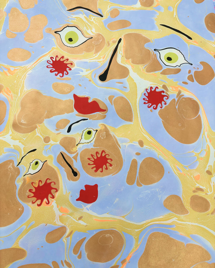 Abstract artwork featuring a marbled pattern of light blue, gold, and tan, with stylized green eyes, black lines, and red splatter motifs.